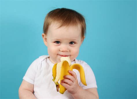 Baby eating a banana - Living