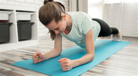 Free Photo | Portrait of cute boy exercising at home