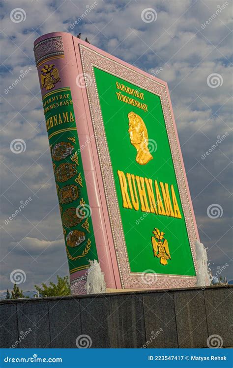 ASHGABAT, TURKMENISTAN - APRIL 17, 2018: Statue of Ruhnama, Book of the Soul, Written by ...