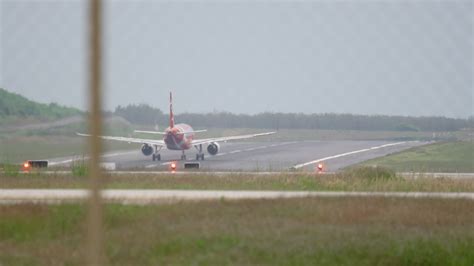 Airfield, view of the runway. Passenger plane taking off. Jet plane at ...