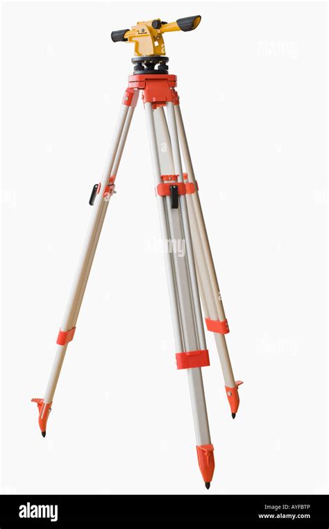 Surveying equipment on tripod Stock Photo - Alamy