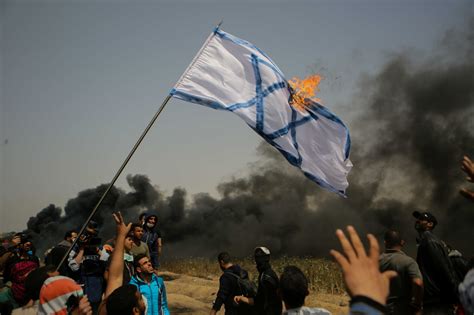 PHOTOS: Why are Palestinians burning Israeli flags in Gaza? | Middle ...