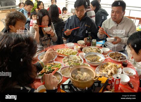 Local people eat traditional Chinese food with chop sticks in Hong Kong ...