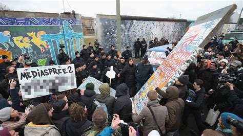 Berlin Wall Protesters Halt Demolition Work | World News | Sky News