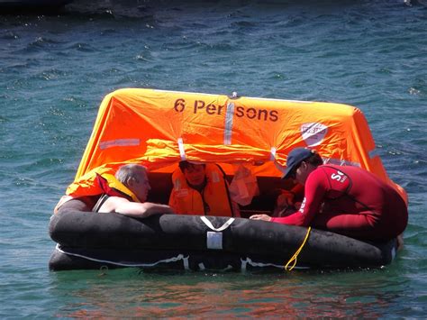 Deploying a life raft: - NSRI