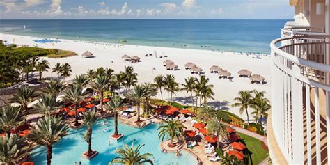 an aerial view of the beach and ocean from a hotel room at the riu cancu