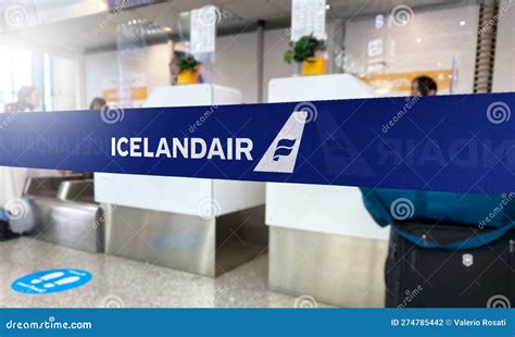 Blue Barrier Tape with the Icelandair Logo Inside an Airport Editorial Photography - Image of ...