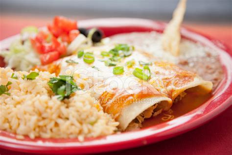 Mexican Food: Plate With Beef Enchiladas, Rice and Refried Beans stock photos - FreeImages.com