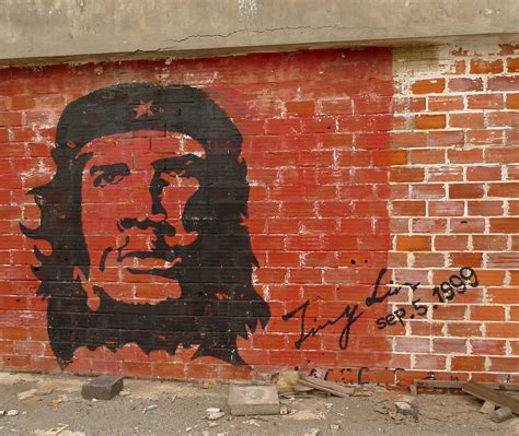 Che Guevara graffiti on red brick – Gem's Photos and Videos