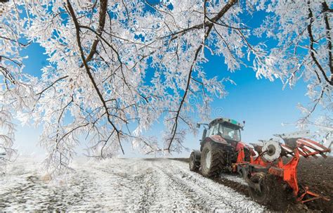 Tractor Plowing a Field in Winter Stock Photo - Image of agricultural, preparation: 241345542