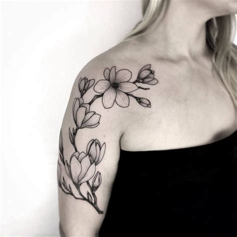 44 Beautiful Magnolia Tattoo Designs | TattooAdore | Magnolia tattoo ...