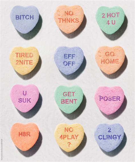 "Mean Valentine Candy Hearts" by Stocksy Contributor "Sean Locke" - Stocksy