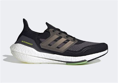 adidas Ultraboost 21 Core Black Solar Yellow FY0374 | SneakerNews.com