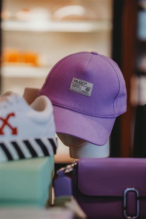 Purple Baseball Cap on Display in a Shop · Free Stock Photo