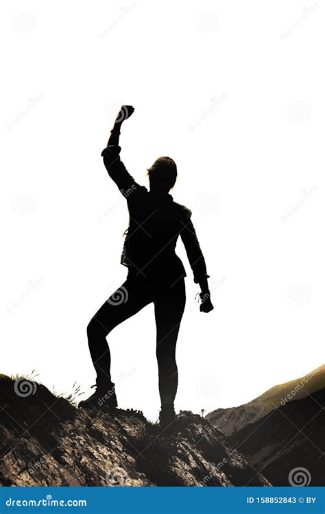 Female Silhouette in Victory Pose on a Rock Stock Image - Image of ...