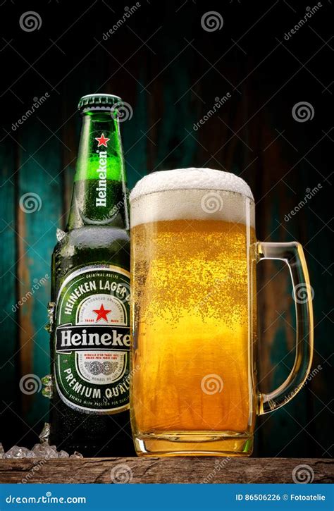 Heineken Lager Beer Bottles And Heineken Beer Aluminum Cans Editorial Photo | CartoonDealer.com ...