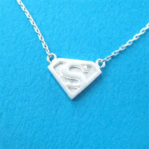 Superman Logo Symbol Charm Necklace in Silver · DOTOLY Animal Jewelry ...