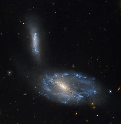 Hubble Studies a Sparkling Galaxy Pair - NASA Science