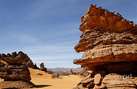 Natural rock formations in the Akakus Mountains in the Sahara Desert Photograph by Robert ...