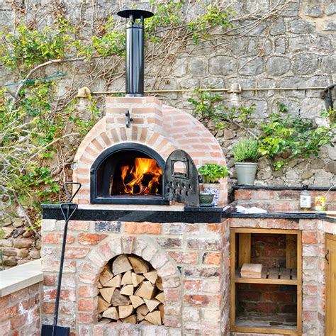 Fuego's Brick 80 is a semi-pro medium-sized brick pizza oven. This artisan garden pizza oven has ...