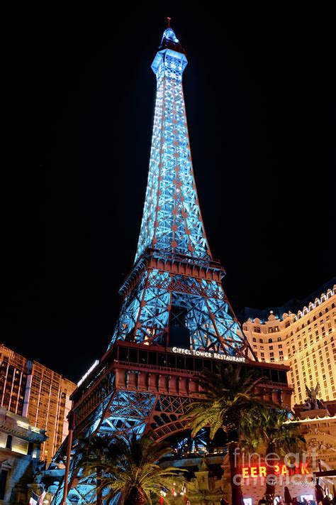 Paris Casino Eiffel Tower Light Show With Blue Lights Photograph by ...