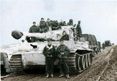 Tank Ace Otto Carius with his Tiger I in winter camo as part of the 502nd Heavy Panzer Battalion ...