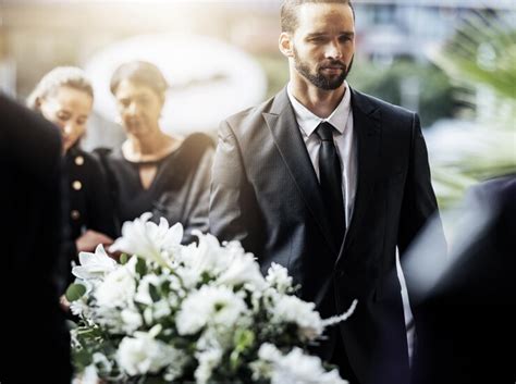 Premium Photo | Death funeral and carry coffin with family mourning sad and depressed for ...