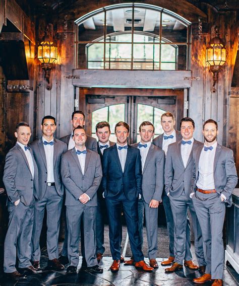 - Repinned by Prindler Productions -handsome grey tux groomsmen attire with blue bowties Wedding ...