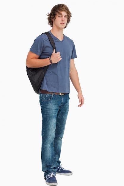 Premium Photo | Male student with a backpack