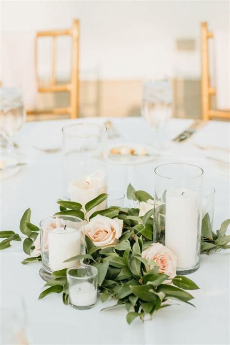 Pillar Candle Centerpieces | Candle wedding centerpieces, Wedding ...