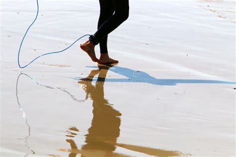 Legs of an Athlete Running Barefoot on a Sandy Beach in Sea Water. Stock Photo - Image of shadow ...