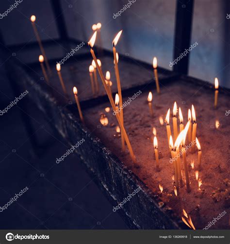 Church candles burning Stock Photo by ©stevanovicigor 136269918