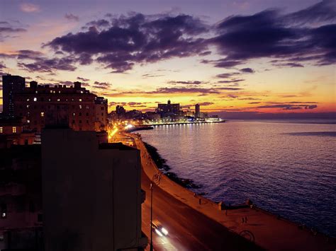 Dramatic sunset over the Malecon, Havana, Cuba Photograph by Millward Shoults