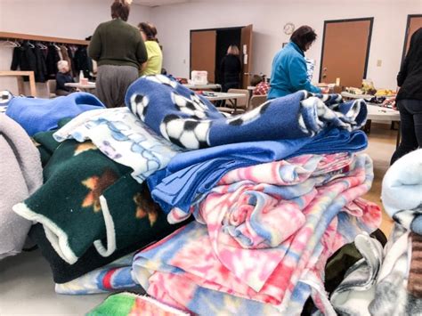 Sewing with love: Volunteers create winter clothing for Winnipeg's homeless | CBC News