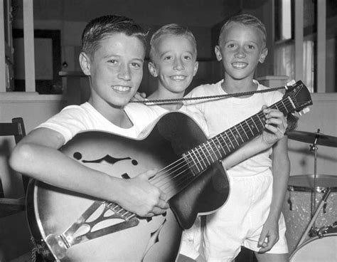 Barry, Robin, and Maurice Gibb, the three young brothers that would go on to form The Bee Gees ...