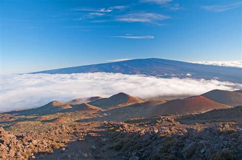 Dozens of earthquakes detected as Hawaii's Mauna Loa, world's largest active volcano, remains in ...