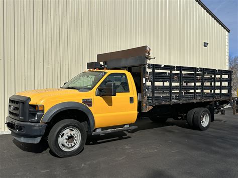 2008 Ford F550 Stake Flatbed w/ Liftgate Truck - Platinum Truck and Equipment