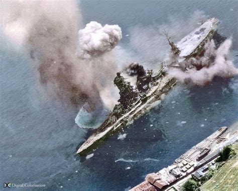 The Hybrid Battleship/Carrier Ise under attack at Kure. July 1945. It was sunk. It never got ...