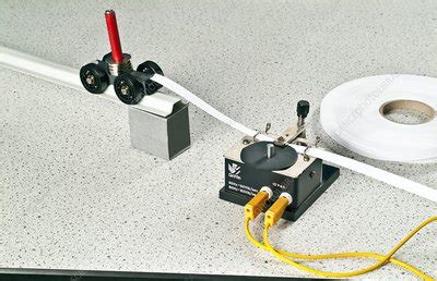 Ticker tape timer experiment - Stock Image - C007/0871 - Science Photo Library