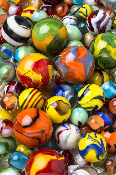 Colorful glass marbles Photograph by Garry Gay