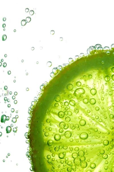 Lime slice in water — Stock Photo © yellow2j #7966952