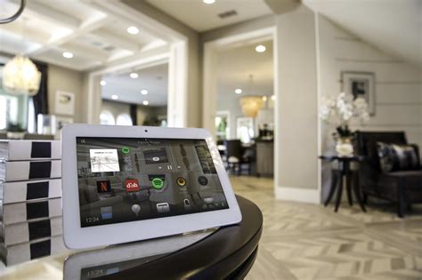 Control4 Smart Home Magazine Touchpanel | IntelligentDesign