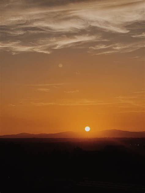 Silhouette of Mountain during Sunset · Free Stock Photo