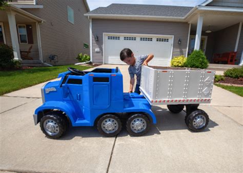 This rideable toy semi truck has a 'CB' and a detachable trailer and your kids need it