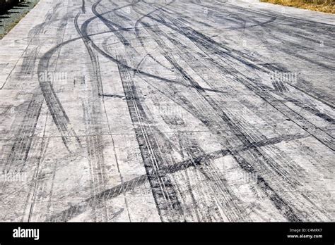 car tyre skid marks on road track Stock Photo - Alamy