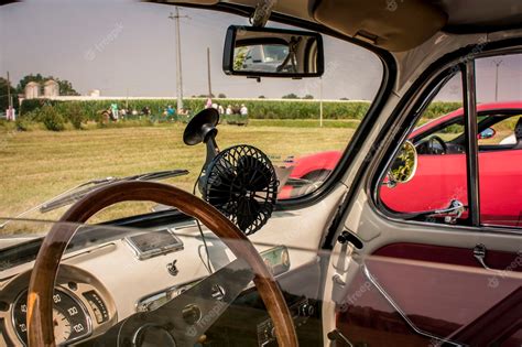 Premium Photo | Interior of a fiat 500 fully restored in view of a typical italian countryside ...