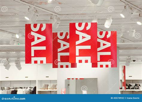 Sale Signs in a Clothing Store Stock Photo - Image of discount, collection: 45574932