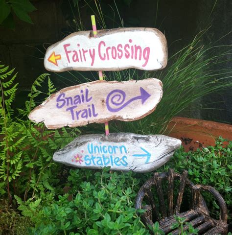 garden fairy sign post with 3 signs rustic painted signs