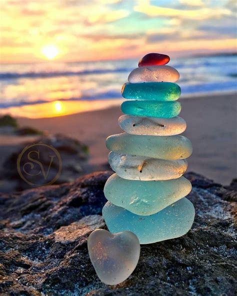 Iridescent stones on the beach. : Images