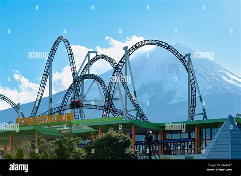 Takabisha World's Steepest Roller Coaster. Background with Mount Fuji and beautiful blue sky ...